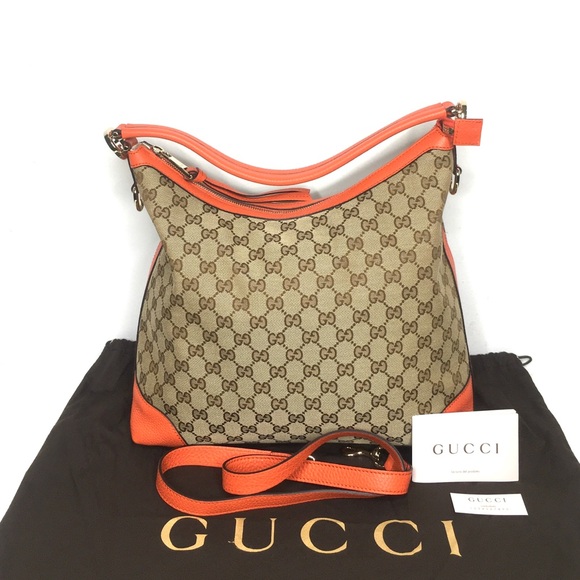 Gucci Handbags - Gucci authentic brown monogram canvas hobo orange leather